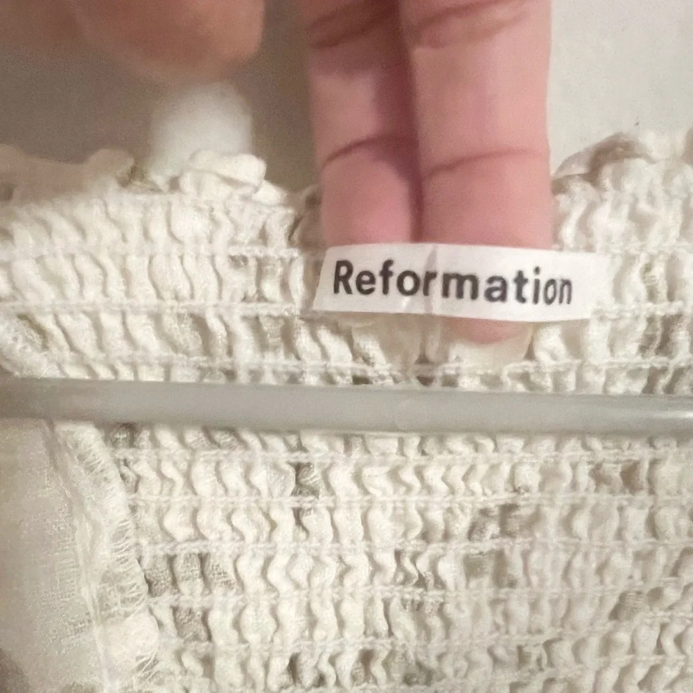 Reformation Smocked linen blouse